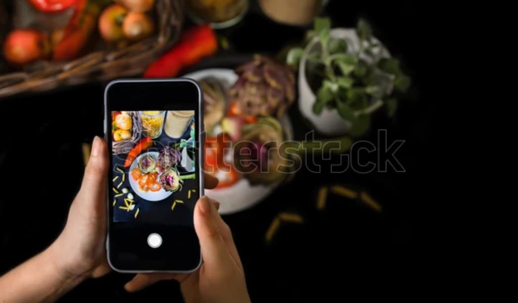 Smartphone on a plate with a cooking app